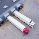 Aerial Shot of Industrial Warehouse/ Storage Building/ Loading