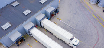 Aerial Shot of Industrial Warehouse/ Storage Building/ Loading