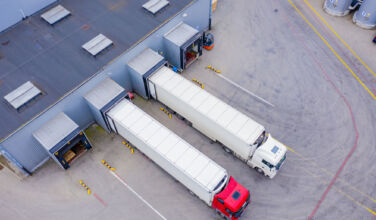 Blackstone participates in first European CMBS as a lender Aerial Shot of Industrial Warehouse/ Storage Building/ Loading