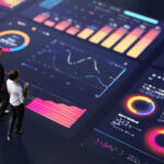 Abstract people standing on a large digital screen, analysing interactive data visualisations and charts for strategic planning. Representing teamwork, technology, and data-driven decision making in a corporate environment.